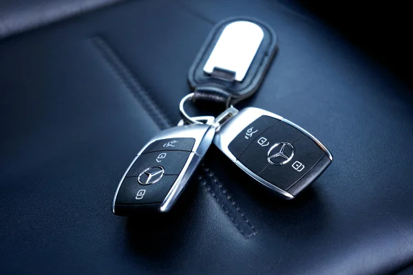 photo of keys on leather car seat
